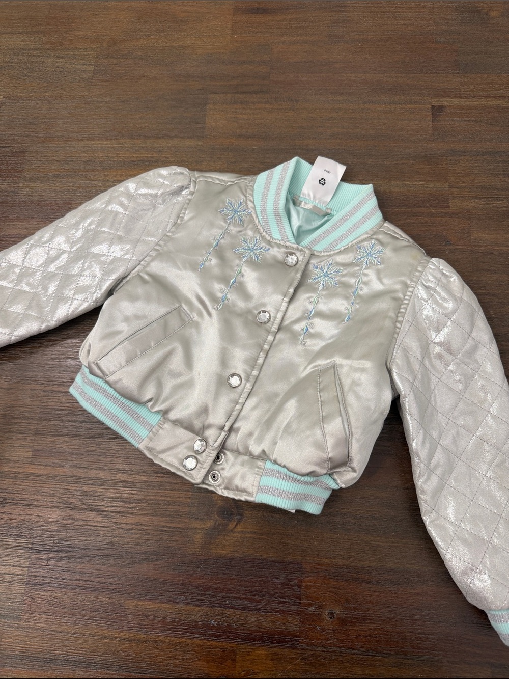 Frozen Disney Metallic Silver Bomber Jacket with Mint Trim and Floral Embroidery